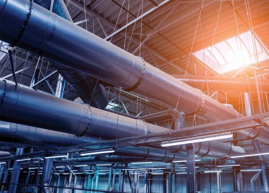 The large circular metal pipelines used in industry.