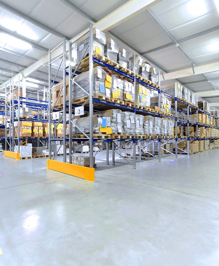 Industrial racking system in industries with loaded racks.