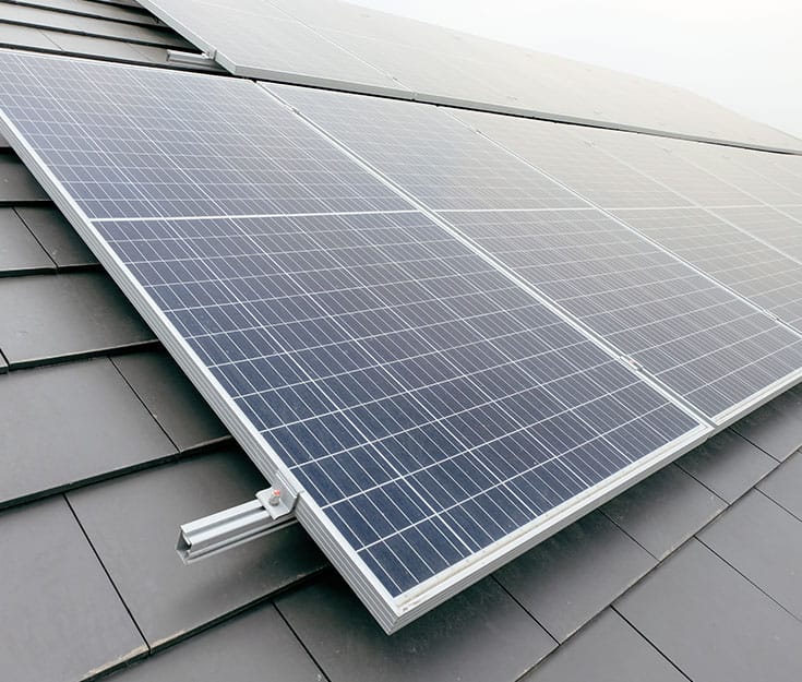 Close-up view of Solar Panel Structures fixed on roofs.