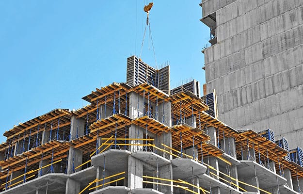 A high-rise residential site under construction.