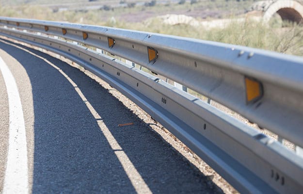 The image of W Beam barriers crash guards and rails on highways.