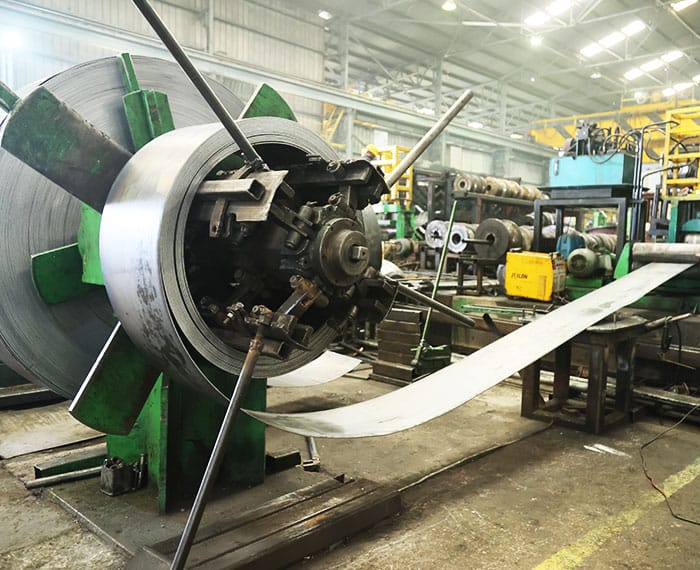 Industrial machinery used for manufacturing hollow sections.