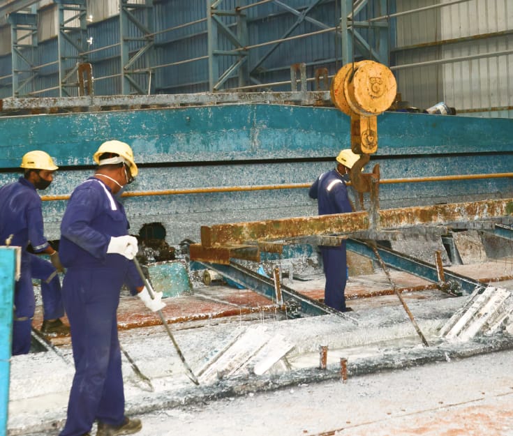 Image of workers working in the galvanization process.