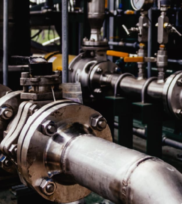 Large circular pipeline with screw connections at joints.