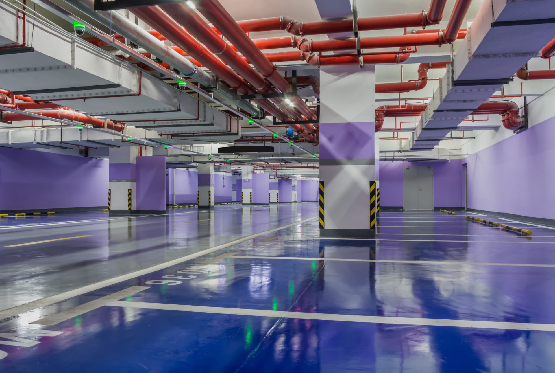 Empty car parking with pipes utilised for the gas pipeline infrastructure.
